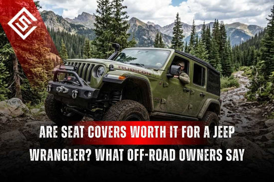 Jeep Wrangler Rubicon off-roading in mountains showing seat covers for Jeep Wrangler protect against mud, sun, & trail wear.