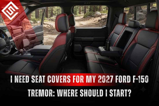 2027 Ford F-150 Tremor interior with black and red seat covers showing trim-specific protection for off-road driving.